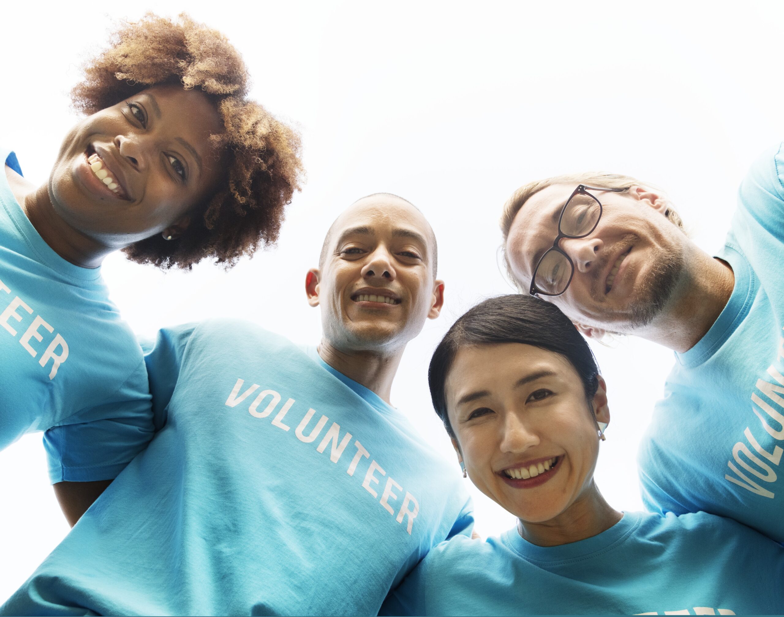 group of happy and diverse volunteers